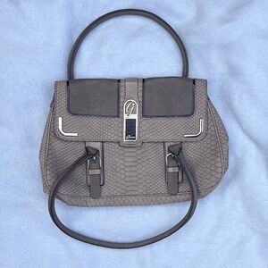 Guess, grey strapped Elegant Gray Handbag with silver hardware, floral inside